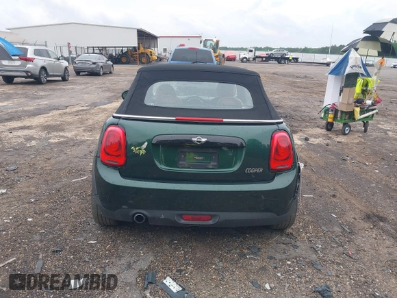 2016 MINI Convertible with VIN WMWWG5C51G3C19231, listed as a IAAI auction lot 42246342 with 93,576 mi miles and . Bid and sale history available at DreamBid. Image 16.