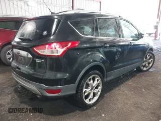 2015 Ford Escape Titanium with VIN 1FMCU9J98FUB00525, listed as a IAAI auction lot 42547989 with 194,040 mi miles and . Bid and sale history available at DreamBid. Image 4.