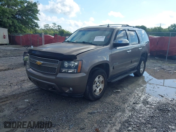 2012 Chevrolet Tahoe LT z VIN 1GNSCBE08CR320257, wystawiony jako IAAI lot #42214920 z przebiegiem 189 532 mil mil oraz . Historia ofert i sprzedaży dostępna na DreamBid. Obrazek 17.