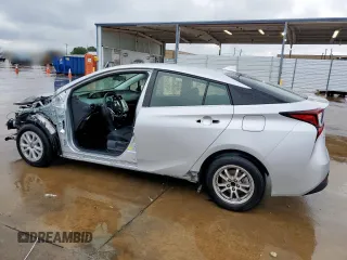 2021 Toyota Prius L Eco with VIN JTDKAMFU1M3142014, listed as a Copart auction lot 55038365 with 76,211 mi miles and Salvage title. Bid and sale history available at DreamBid. Image 2.