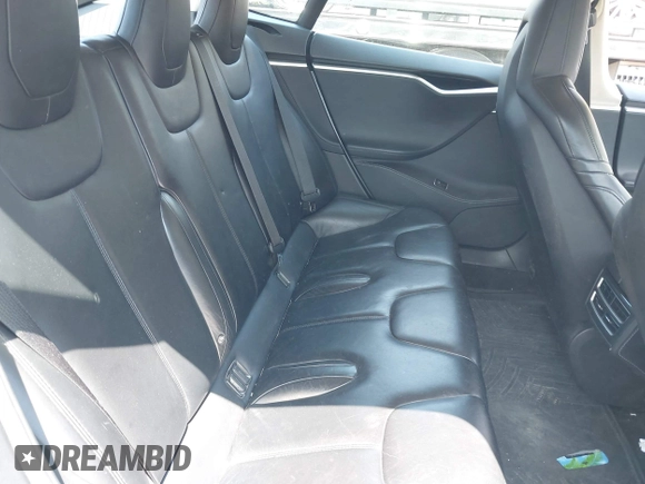 2015 Tesla Model S 85D with VIN 5YJSA1H2XFF084145, listed as a IAAI auction lot 42101755 with 105,660 mi miles. Bid and sale history available at carsss.com. Image 8.