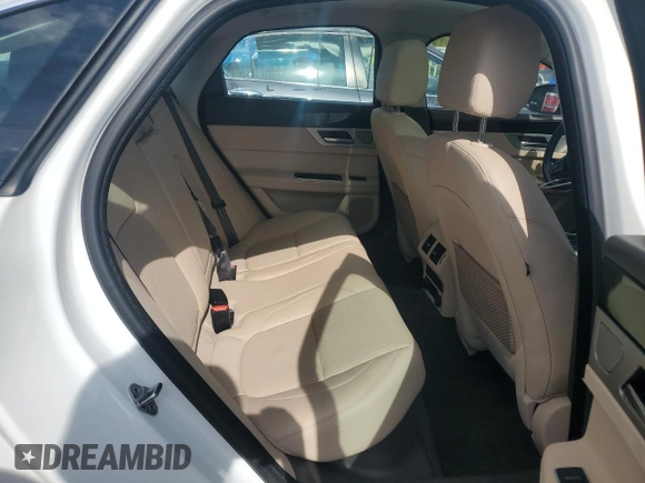 2016 Jaguar XF 35t Prestige with VIN SAJBK4BV3GCY19128, listed as a Copart auction lot 74187394 with 70,510 mi miles and Salvage Title. Bid and sale history available at carsss.com. Image 10.