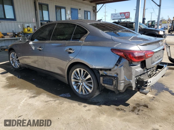2019 Infiniti Q50 Luxe z VIN JN1EV7AP4KM514928, wystawiony jako Copart lot #56694755 z przebiegiem 63 705 mil mil oraz Szkoda całkowita • Salvage title. Historia ofert i sprzedaży dostępna na DreamBid. Obrazek 2.
