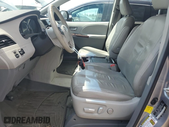 2011 Toyota Sienna XLE AAS с VIN 5TDYK3DCXBS169073, выставлен на аукционе Copart как лот 62084925 с пробегом 153 888 миль миль и Списание • Salvage title. История ставок и продаж доступна на DreamBid. Изображение 7.