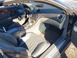 2005 Mercedes-Benz SL 55 AMG with VIN WDBSK74F75F099722, listed as a IAAI auction lot 41308261 with 60,134 mi miles and . Bid and sale history available at DreamBid. Image 5.