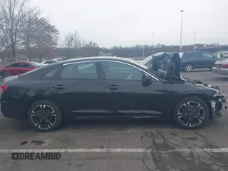 2024 Kia K5 GT-Line z VIN 5XXG64J22RG257080, wystawiony jako IAAI lot #42026127 z przebiegiem 19 477 mil mil oraz . Historia ofert i sprzedaży dostępna na DreamBid. Obrazek 13.