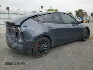 2022 Tesla Model Y Performance z VIN 7SAYGDEF1NF457494, wystawiony jako Copart lot #43287315 z przebiegiem 79 855 mil mil oraz Szkoda całkowita • Salvage title. Historia ofert i sprzedaży dostępna na DreamBid. Obrazek 3.