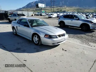 2003 Ford Mustang Standard z VIN 1FAFP40463F327722, wystawiony jako Copart lot #55042765 z przebiegiem 117 010 mil mil oraz Szkoda całkowita • Salvage title. Historia ofert i sprzedaży dostępna na DreamBid. Obrazek 13.