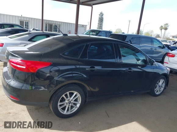 2015 Ford Focus SE with VIN 1FADP3F25FL330463, listed as a IAAI auction lot 41755867 with 72,725 mi miles. Bid and sale history available at carsss.com. Image 13.