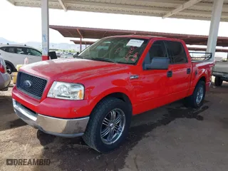 2004 Ford F-150 XLT with VIN 1FTRW12W74FA15854, listed as a IAAI auction lot 41917424 with 325,330 mi miles. Bid and sale history available at carsss.com. Image 2.