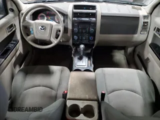 2011 Mazda Tribute Touring with VIN 4F2CY0C71BKM06780, listed as a Copart auction lot 77748114 with 144,163 mi miles and Salvage Title. Bid and sale history available at carsss.com. Image 8.