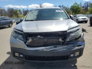 2017 Honda Ridgeline RTL-T with VIN 5FPYK3F65HB012868, listed as a Copart auction lot 57562885 with 115,530 mi miles and Salvage title. Bid and sale history available at DreamBid. Image 5.