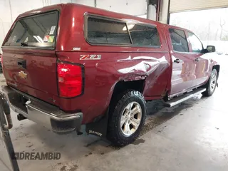 2014 Chevrolet Silverado 1500 LT with VIN 3GCUKREC9EG358476, listed as a IAAI auction lot 41866756 with 210,880 mi miles and . Bid and sale history available at DreamBid. Image 4.