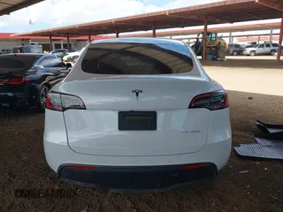 2021 Tesla Model Y Long Range with VIN 5YJYGAEE9MF254113, listed as a IAAI auction lot 42045256 with Not Provided miles. Bid and sale history available at carsss.com. Image 15.