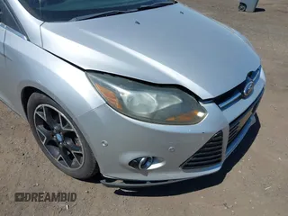 2012 Ford Focus Titanium with VIN 1FAHP3N28CL149792, listed as a IAAI auction lot 42133034 with 125,562 mi miles and . Bid and sale history available at carsss.com. Image 6.