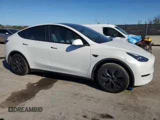 2024 Tesla Model Y with VIN 7SAYGDED3RF130826, listed as a Copart auction lot 47735185 with 10,467 mi miles and Non Repairable. Bid and sale history available at DreamBid. Image 4.