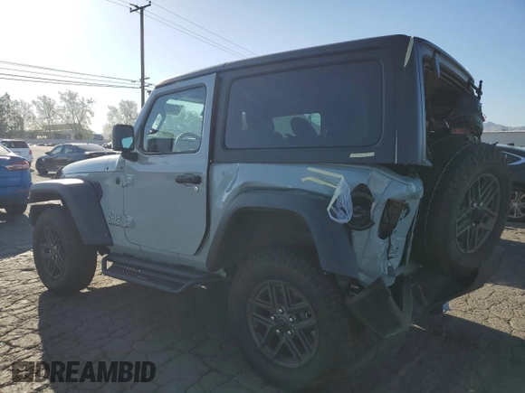 2024 Jeep Wrangler Sport S z VIN 1C4PJXAN2RW120827, wystawiony jako Copart lot #50378494 z przebiegiem 4 147 mil mil oraz Szkoda całkowita • Salvage title. Historia ofert i sprzedaży dostępna na DreamBid. Obrazek 2.