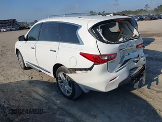 2014 Infiniti QX60 with VIN 5N1AL0MM7EC511196, listed as a IAAI auction lot 42028198 with 109,313 mi miles and . Bid and sale history available at DreamBid. Image 3.