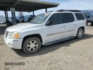 2003 GMC Envoy SLT z VIN 1GKET16S236102577, wystawiony jako Copart lot #50272085 z przebiegiem 255 253 mil mil oraz Tytuł czysty. Historia ofert i sprzedaży dostępna na DreamBid. Obrazek 1.