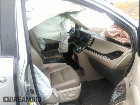 2015 Toyota Sienna XLE with VIN 5TDYK3DC0FS589947, listed as a IAAI auction lot 36567379 with 130,969 mi miles and . Bid and sale history available at DreamBid. Image 5.