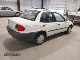 1996 Geo Metro z VIN 2C1MR529XT6777469, wystawiony jako IAAI lot #41392706 z przebiegiem 353 287 mil mil oraz . Historia ofert i sprzedaży dostępna na DreamBid. Obrazek 4.