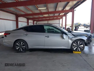 2019 Nissan Altima 2.5 SL with VIN 1N4BL4EV0KC180633, listed as a IAAI auction lot 41770419 with 113,740 mi miles. Bid and sale history available at carsss.com. Image 12.
