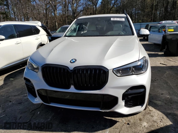 2022 BMW X5 sDrive40i with VIN 5UXCR4C01N9J97204, listed as a Copart auction lot 88157405 with 34,788 mi miles and Salvage Title. Bid and sale history available at carsss.com. Image 5.