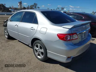 2011 Toyota Corolla L with VIN 2T1BU4EEXBC693371, listed as a IAAI auction lot 41692477 with 176,290 mi miles. Bid and sale history available at carsss.com. Image 3.