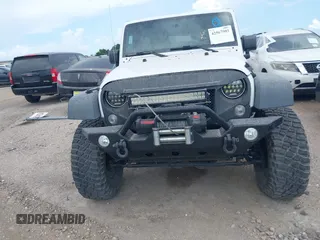 2011 Jeep Wrangler Unlimited Rubicon with VIN 1J4BA6H10BL536027, listed as a IAAI auction lot 42567901 with 164,487 mi miles and . Bid and sale history available at DreamBid. Image 6.