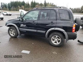 2003 Chevrolet Tracker ZR2 z VIN 2CNBJ734736946410, wystawiony jako Copart lot #82210474 z przebiegiem 61 414 mil mil oraz Szkoda całkowita • Salvage title. Historia ofert i sprzedaży dostępna na DreamBid. Obrazek 2.