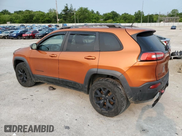 2015 Jeep Cherokee Trailhawk with VIN 1C4PJMBS0FW675807, listed as a Copart auction lot 58800615 with 109,019 mi miles and Salvage title. Bid and sale history available at DreamBid. Image 2.