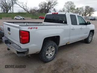 2016 Chevrolet Silverado 1500 LT with VIN 1GCVKREC7GZ338959, listed as a IAAI auction lot 42147778 with 140,570 mi miles and . Bid and sale history available at DreamBid. Image 4.