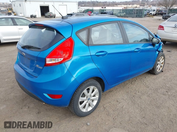 2013 Ford Fiesta SE with VIN 3FADP4EJ6DM130511, listed as a IAAI auction lot 41757636 with 153,664 mi miles. Bid and sale history available at carsss.com. Image 4.