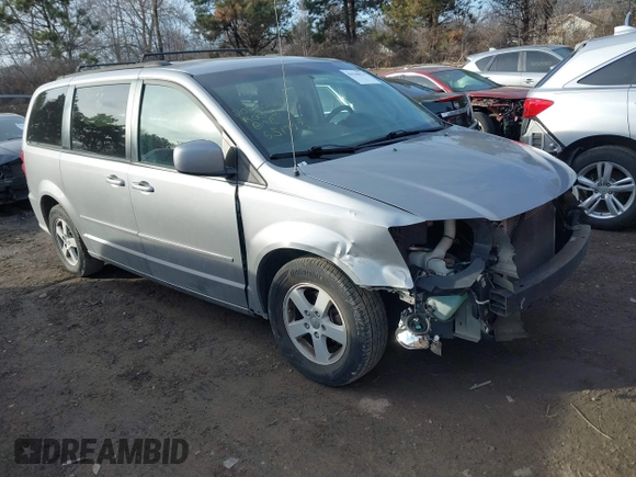 2013 Dodge Grand Caravan SXT with VIN 2C4RDGCG8DR551723, listed as a IAAI auction lot 41510574 with 183,432 mi miles and . Bid and sale history available at DreamBid. Image 1.