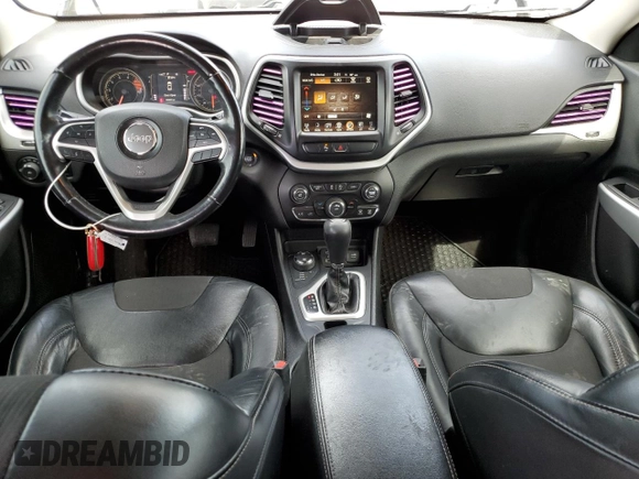 2018 Jeep Cherokee Latitude Plus with VIN 1C4PJMLX0JD562180, listed as a Copart auction lot 57631285 with 105,923 mi miles and Salvage title. Bid and sale history available at DreamBid. Image 8.