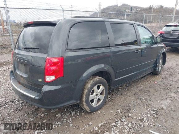 2012 Dodge Grand Caravan SXT with VIN 2C4RDGCG8CR242235, listed as a IAAI auction lot 41922083 with 124,306 mi miles and . Bid and sale history available at DreamBid. Image 4.