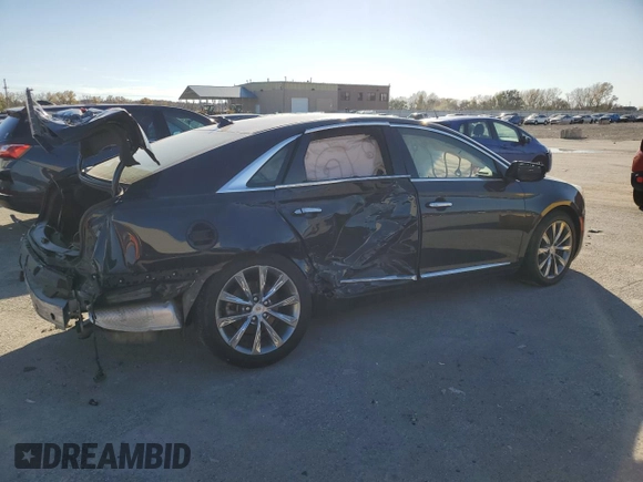 2014 Cadillac XTS z VIN 2G61L5S39E9300636, wystawiony jako Copart lot #78068634 z przebiegiem 117 549 mil mil oraz Szkody całkowita. Historia ofert i sprzedaży dostępna na DreamBid. Obrazek 3.