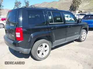 2013 Jeep Patriot Latitude with VIN 1C4NJPFA5DD230031, listed as a IAAI auction lot 41641768 with 153,910 mi miles. Bid and sale history available at carsss.com. Image 4.