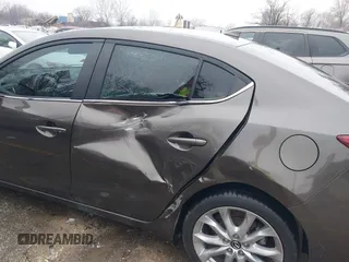 2014 Mazda 3 S Touring with VIN JM1BM1V31E1111499, listed as a IAAI auction lot 41476457 with 109,337 mi miles and . Bid and sale history available at DreamBid. Image 6.