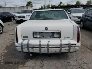 1999 Cadillac DeVille z VIN 1G6KD54Y7XU801251, wystawiony jako Copart lot #52819854 z przebiegiem 180 871 mil mil oraz Szkoda całkowita • Salvage title. Historia ofert i sprzedaży dostępna na DreamBid. Obrazek 6.