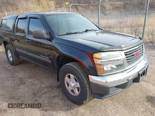2004 GMC Canyon 1SB SLE Z85 with VIN 1GTDT136248183245, listed as a IAAI auction lot 41824467 with 196,418 mi miles. Bid and sale history available at carsss.com. Image 1.