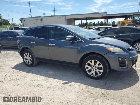 2011 Mazda CX-7 S Grand Touring z VIN JM3ER4D33B0355181, wystawiony jako Copart lot #69687474 z przebiegiem 223 622 mil mil oraz Nie do naprawy • Non repairable. Historia ofert i sprzedaży dostępna na DreamBid. Obrazek 4.