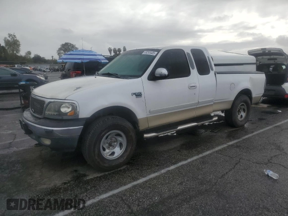2002 Ford F-150 XL with VIN 1FTRX17LX2KB25894, listed as a Copart auction lot 49283405 with 247,998 mi miles and Salvage title. Bid and sale history available at DreamBid. Image 1.