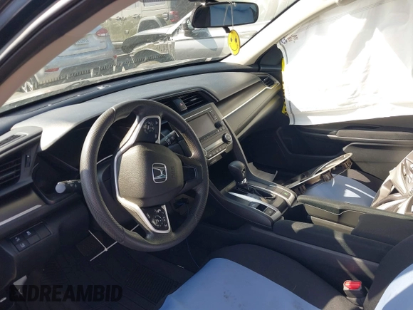 2020 Honda Civic LX z VIN 19XFC2F69LE203697, wystawiony jako IAAI lot #41608520 z przebiegiem 46 735 mil mil oraz . Historia ofert i sprzedaży dostępna na DreamBid. Obrazek 5.