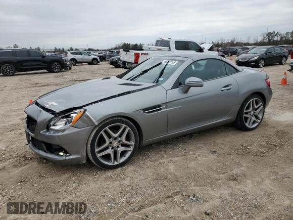 2014 Mercedes-Benz SLK 250 with VIN WDDPK4HA0EF091357, listed as a Copart auction lot 46293775 with 71,994 mi miles and Salvage title. Bid and sale history available at DreamBid. Image 1.