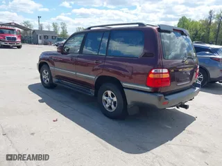 2002 Toyota Land Cruiser with VIN JTEHT05J422022565, listed as a IAAI auction lot 42042565 with 550,000 mi miles. Bid and sale history available at carsss.com. Image 3.