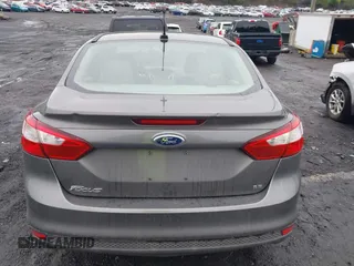 2012 Ford Focus SE z VIN 1FAHP3F29CL442731, wystawiony jako IAAI lot #42517796 z przebiegiem 148 728 mil mil oraz . Historia ofert i sprzedaży dostępna na DreamBid. Obrazek 16.