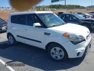 2013 Kia Soul with VIN KNDJT2A5XD7543239, listed as a IAAI auction lot 41954179 with 119,112 mi miles. Bid and sale history available at carsss.com. Image 1.