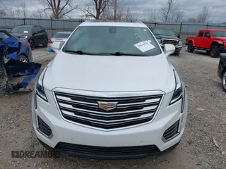 2019 Cadillac XT5 Premium Luxury FWD z VIN 1GYKNERS1KZ290754, wystawiony jako IAAI lot #41816074 z przebiegiem 91 585 mil mil oraz . Historia ofert i sprzedaży dostępna na DreamBid. Obrazek 12.