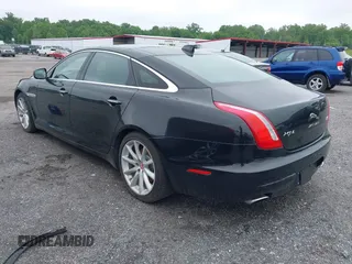 2016 Jaguar XJ Portfolio z VIN SAJWJ2GD0G8V97045, wystawiony jako IAAI lot #42410272 z przebiegiem 101 116 mil mil oraz . Historia ofert i sprzedaży dostępna na DreamBid. Obrazek 3.